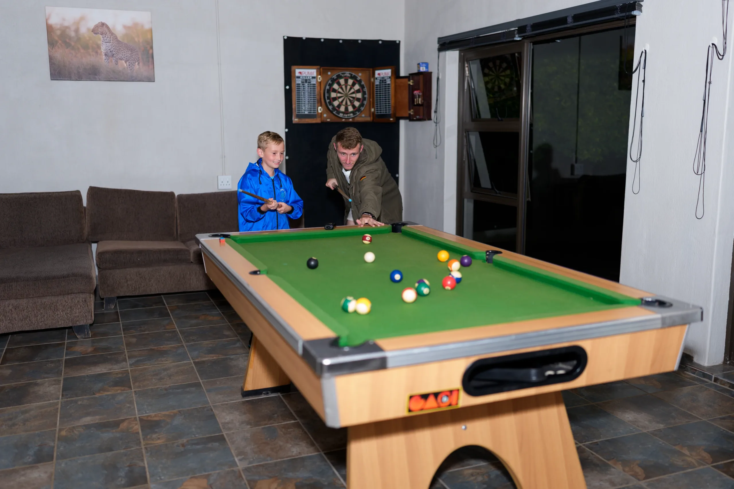 Pool table in shared entertainment area